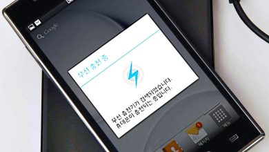 A smartphone snapped onto a magnetic wireless charger